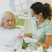 dentist-with-patient-dental-chair